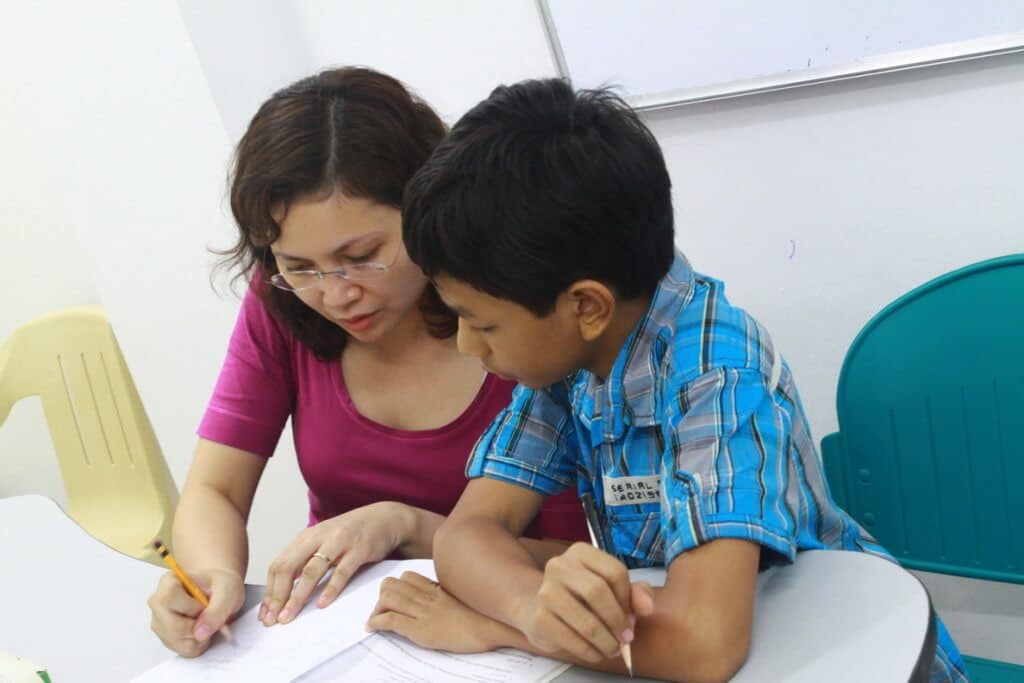 teacher teaching singapore math