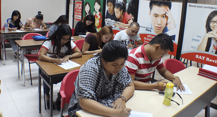 Students studying for civil service exam review